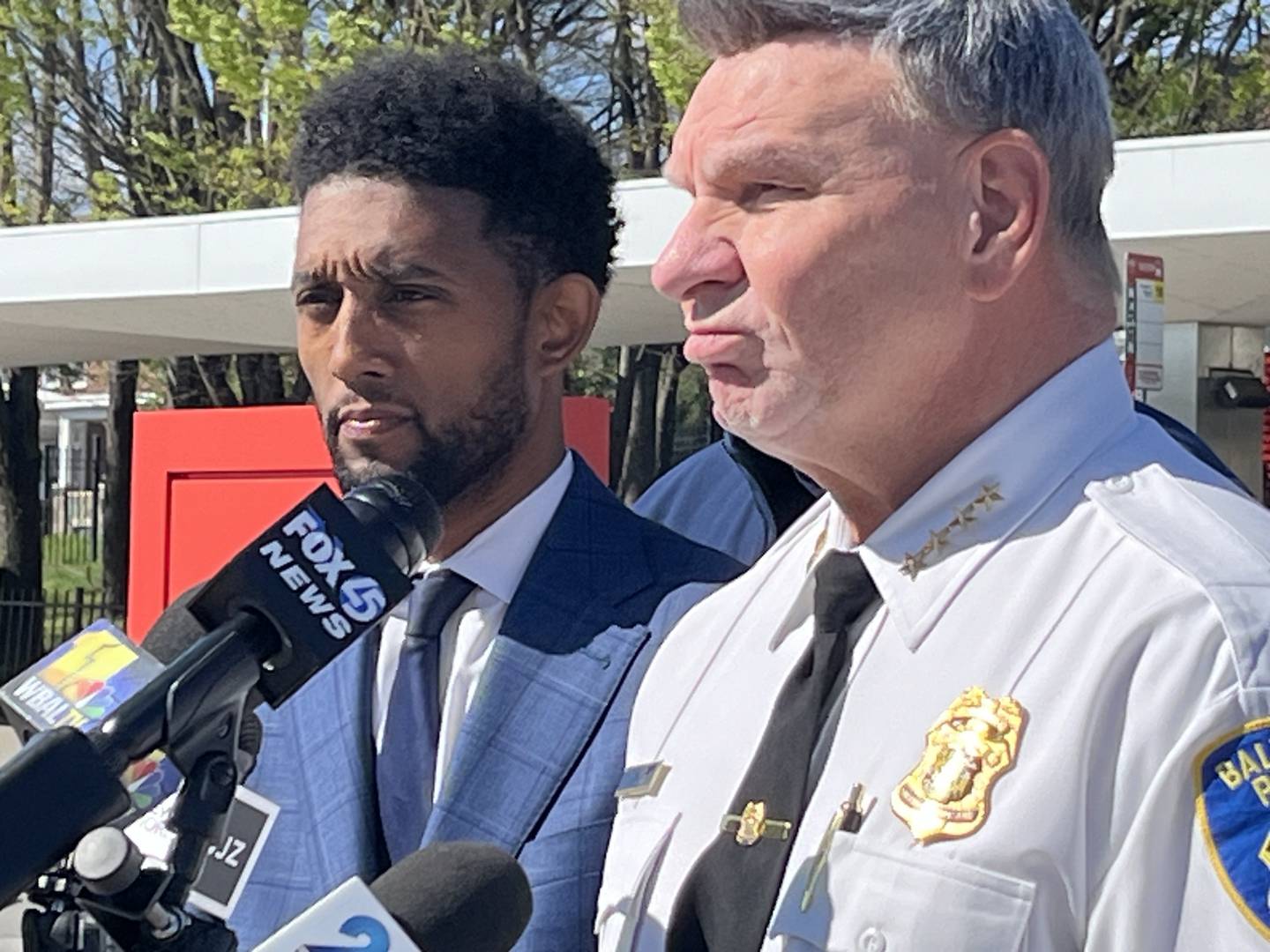 Mayor Brandon Scott and Police Commissioner Richard Worley address reporters Saturday, April 13, 2024, outside the Mondawmin Mall, where a 7-year-old girl was shot.
