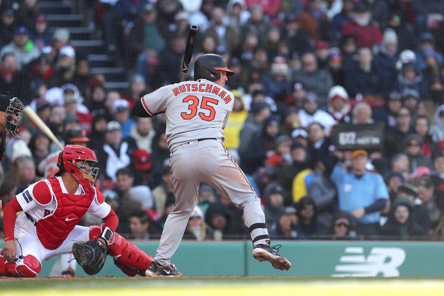 BOSTON, MASSACHUSETTS - MARCH 30: Adley Rutschman #35 of the Baltimore Orioles bats during the fifth inning against the Boston Red Sox on Opening Day at Fenway Park on March 30, 2023 in Boston, Massachusetts.