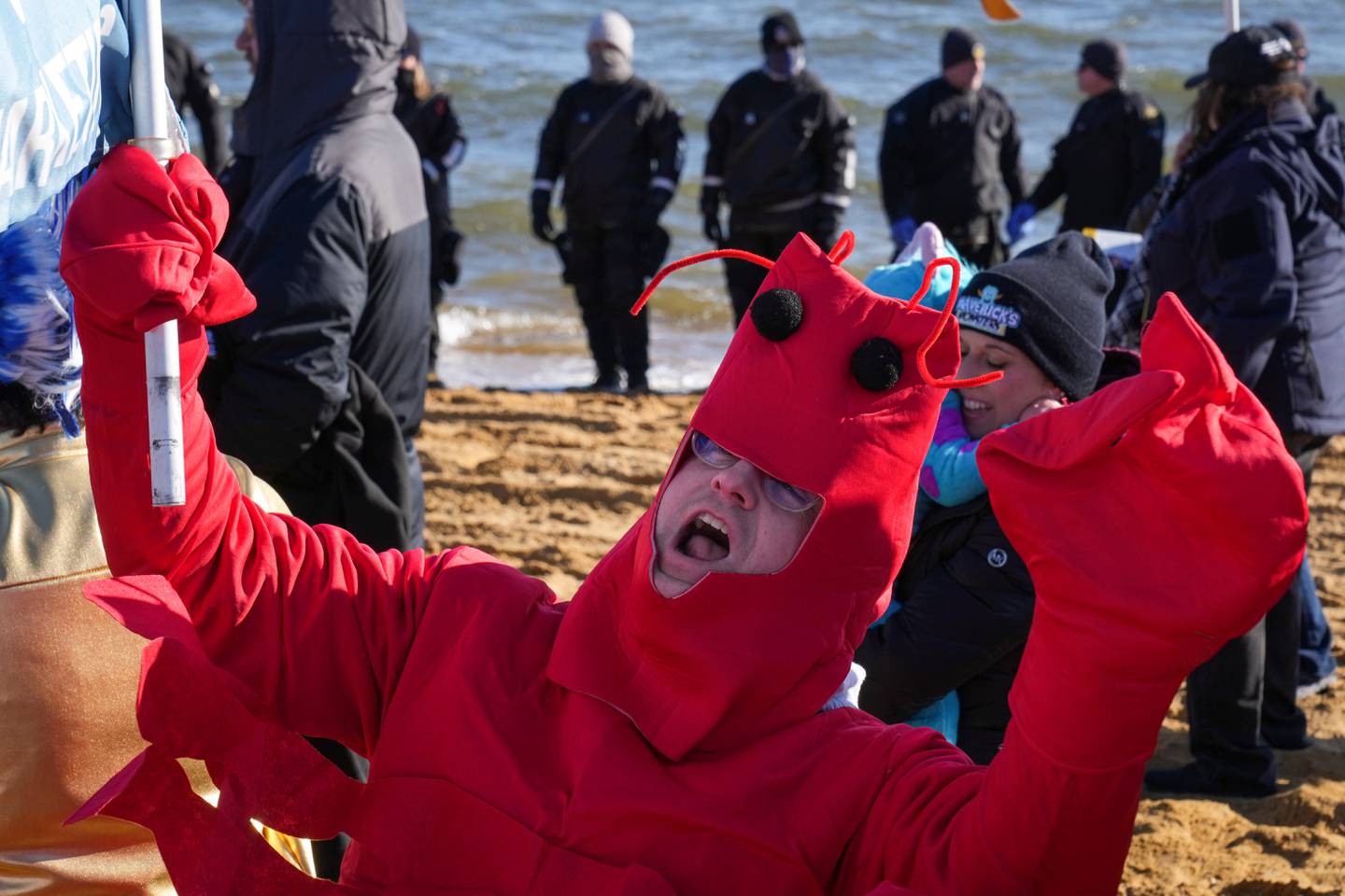 A man dressed a lobster enters the costume contest at the Polar Bear Plunge on 2/4/23 at Sandy Point State Park. The event, now in its 27th year, has raised more than $3.4 million for Special Olympics Maryland this year.