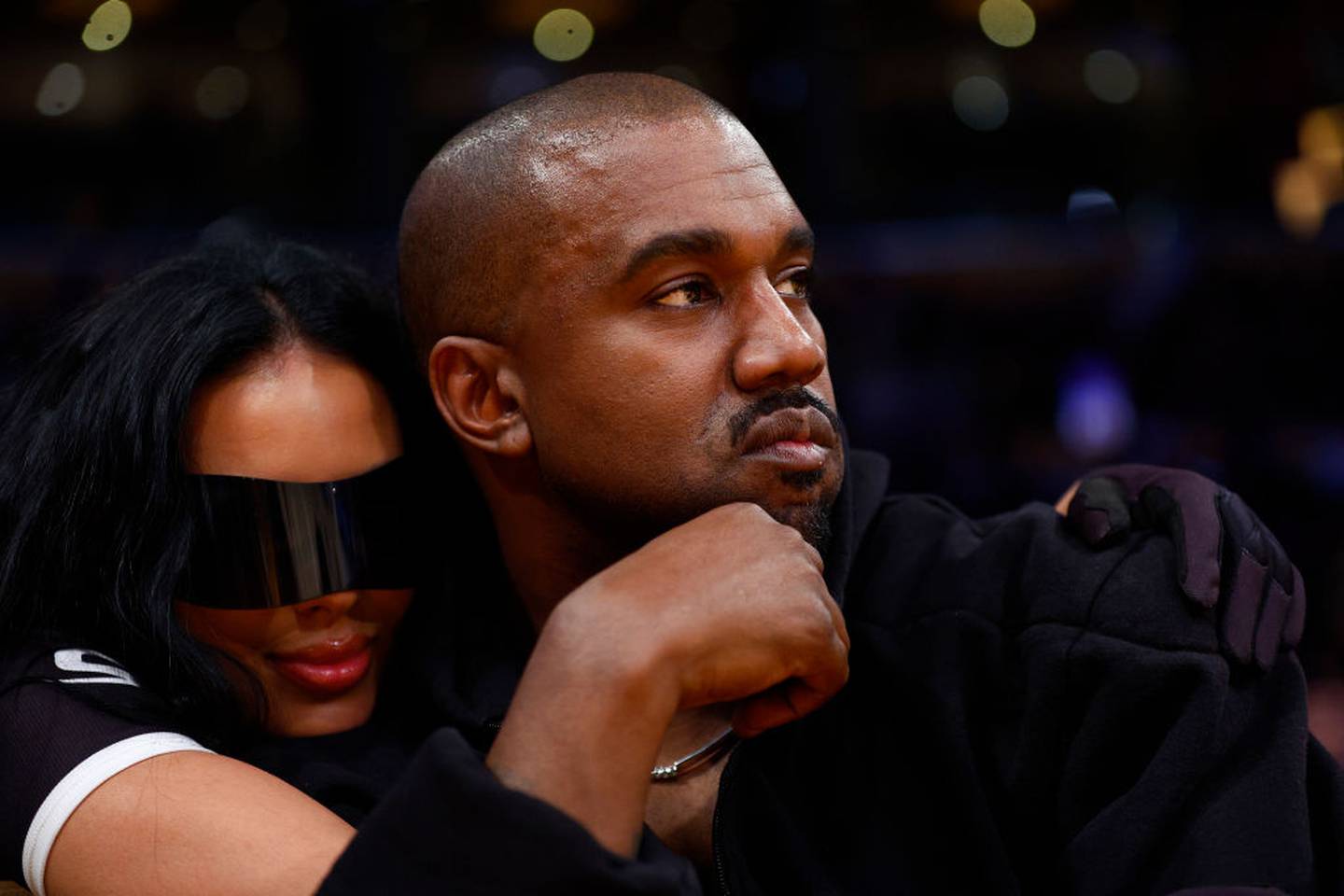 LOS ANGELES, CALIFORNIA - MARCH 11:  Rapper Kanye West and girlfriend Chaney Jones attend a game between the Washington Wizards and the Los Angeles Lakers in the fourth quarter at Crypto.com Arena on March 11, 2022 in Los Angeles, California.  NOTE TO USER: User expressly acknowledges and agrees that, by downloading and/or using this Photograph, user is consenting to the terms and conditions of the Getty Images License Agreement.
