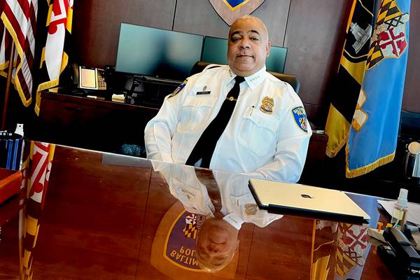 Baltimore Chief of Police, Michael S. Harrison in his office.