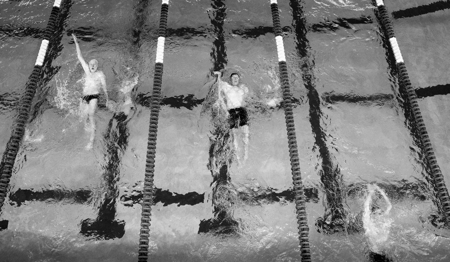 Stanley Hansen of PA, John Vail of MD, and Stephen Crane compete in the 100-yard backstroke, during the National Senior Games at Trees Pool at the University of Pittsburgh, Friday, July 14, 2023.
