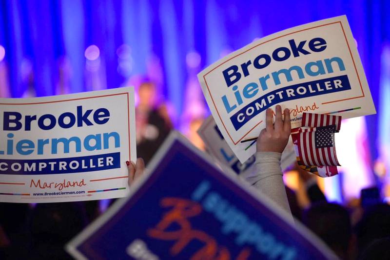 Brooke Lierman signs at an election night party.