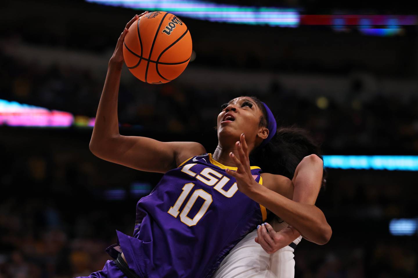 DALLAS, TEXAS - APRIL 02: Angel Reese #10 of the LSU Lady Tigers battles for the ball during the third quarter against the Iowa Hawkeyes during the 2023 NCAA Women's Basketball Tournament championship game at American Airlines Center on April 02, 2023 in Dallas, Texas.