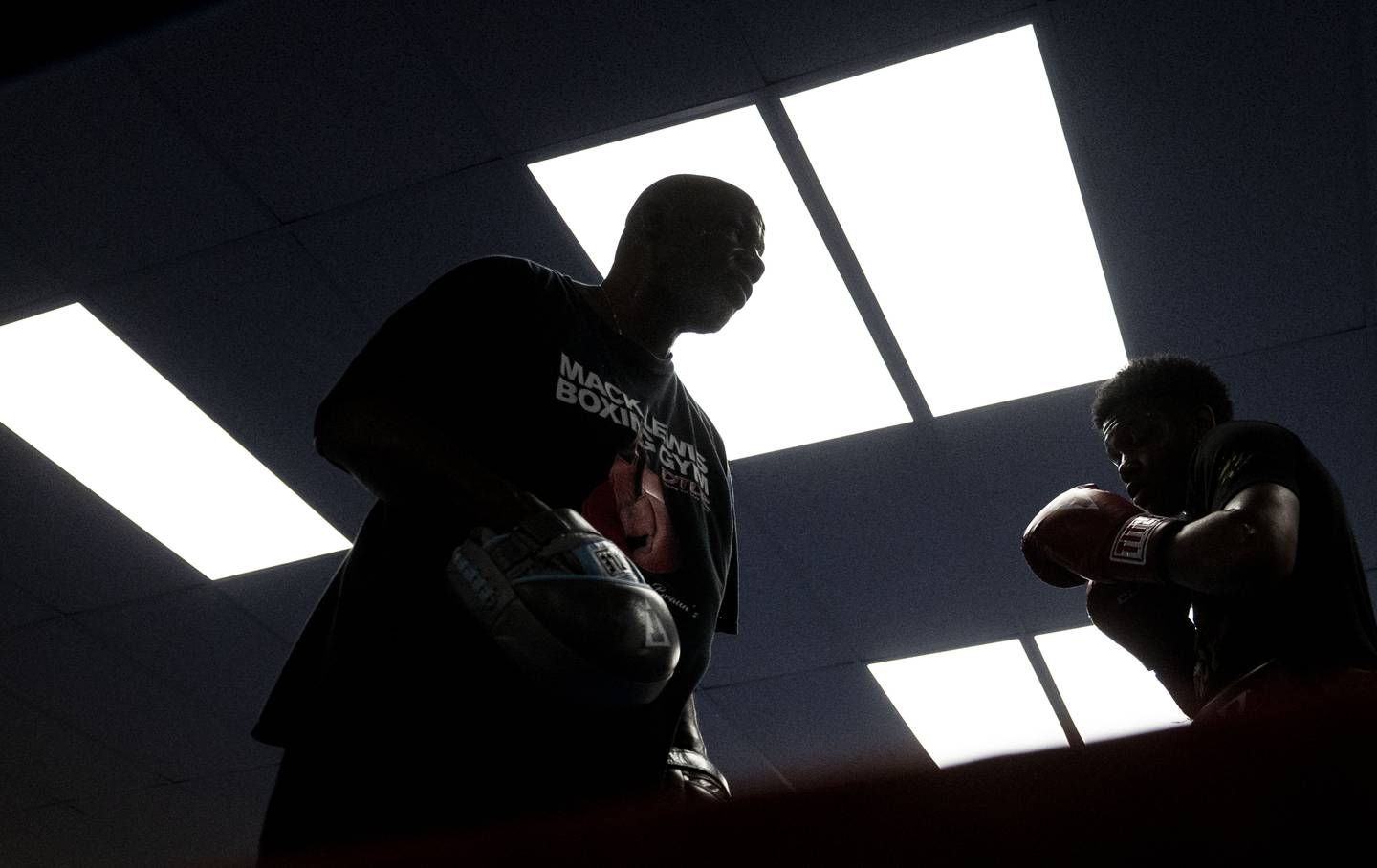 Warren Boardley, Director of Boxing Operations, runs drills with Myron Green at Mack Lewis Boxing Gym, in Baltimore, March 31, 2023.