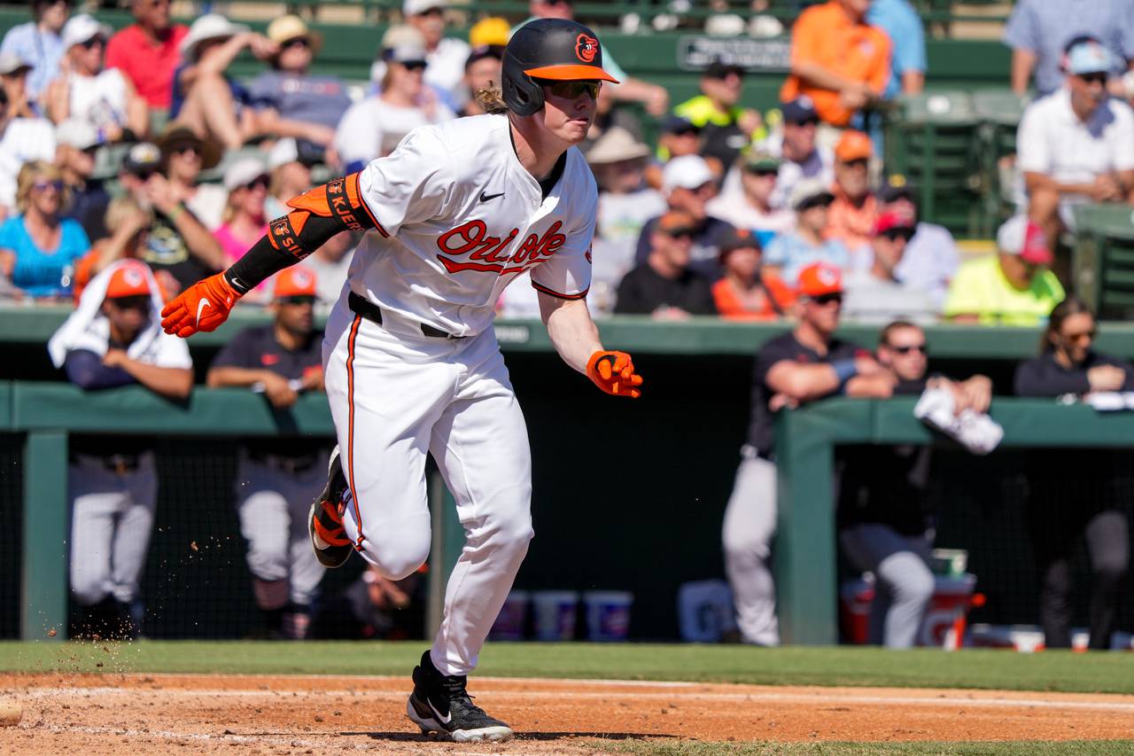 Baltimore Orioles right fielder Heston Kjerstad (13) runs to first base during a Grapefruit League game against the Detroit Tigers at Ed Smith Stadium on February 27, 2024.