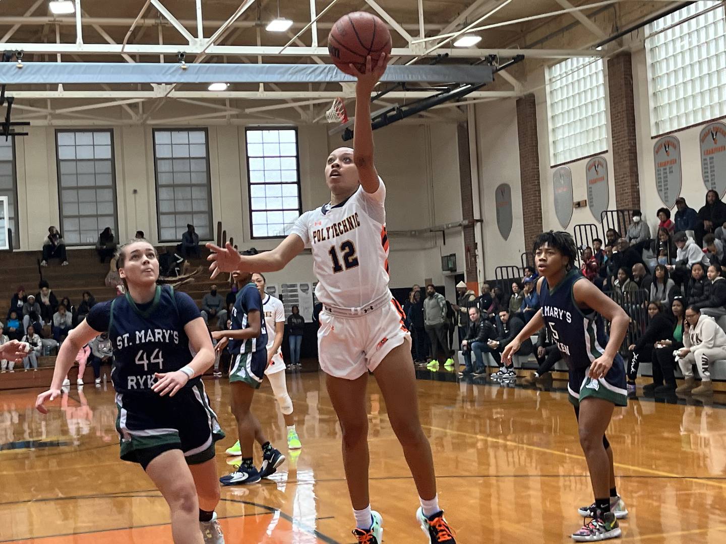 Poly's Mickelle Lowery goes up for two points during Saturday's girls basketball match with St. Mary's Ryken at the Public vs. Private Challenge. The top-ranked Engineers defeated St. Mary's Ryken at the annual mixer at McDonogh.