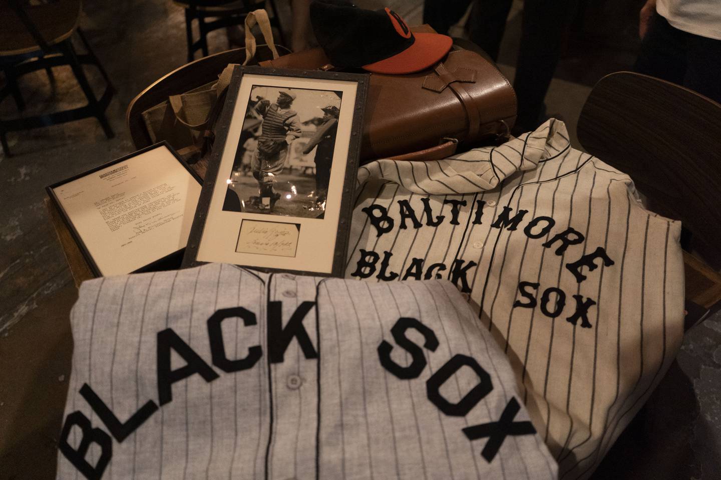 Baltimore Black Sox artifacts like photos, signatures and jersey replicas. Bernard McKenna brought the replicas to Peabody Heights Brewery on August 18, 2022.
