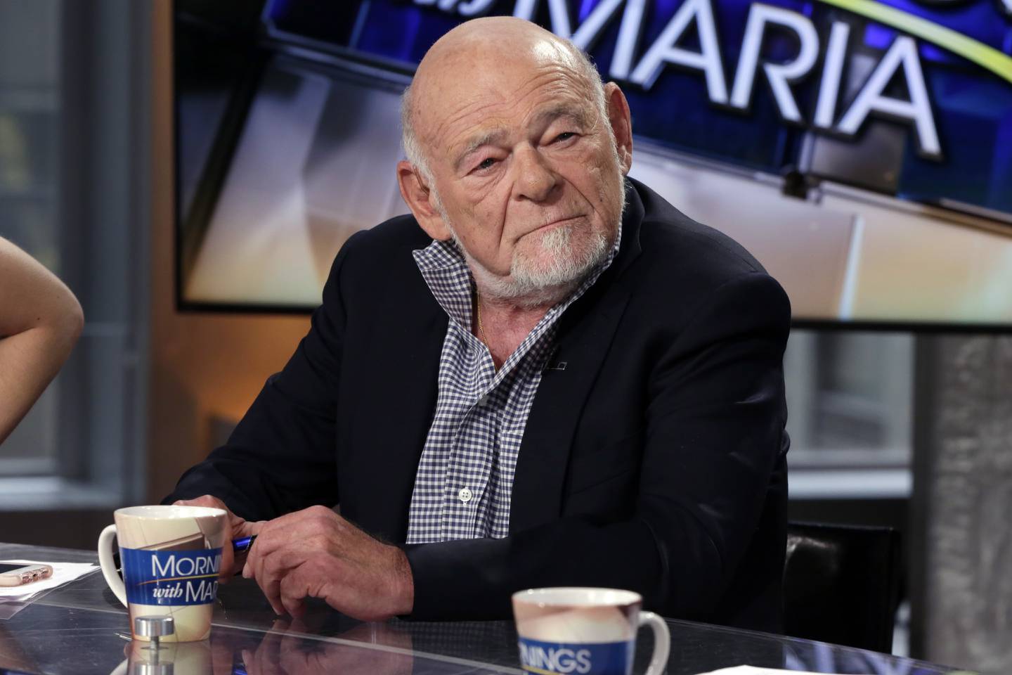 FILE - Sam Zell listens during an interview by Maria Bartiromo, during her "Mornings with Maria Bartiromo" program on the Fox Business Network, in New York, on Aug. 15, 2017. Zell, a Chicago real estate magnate who earned a multibillion-dollar fortune and a reputation as "the grave dancer" for his ability to revive moribund properties, died on Thursday, May 18, 2023. He was 81.