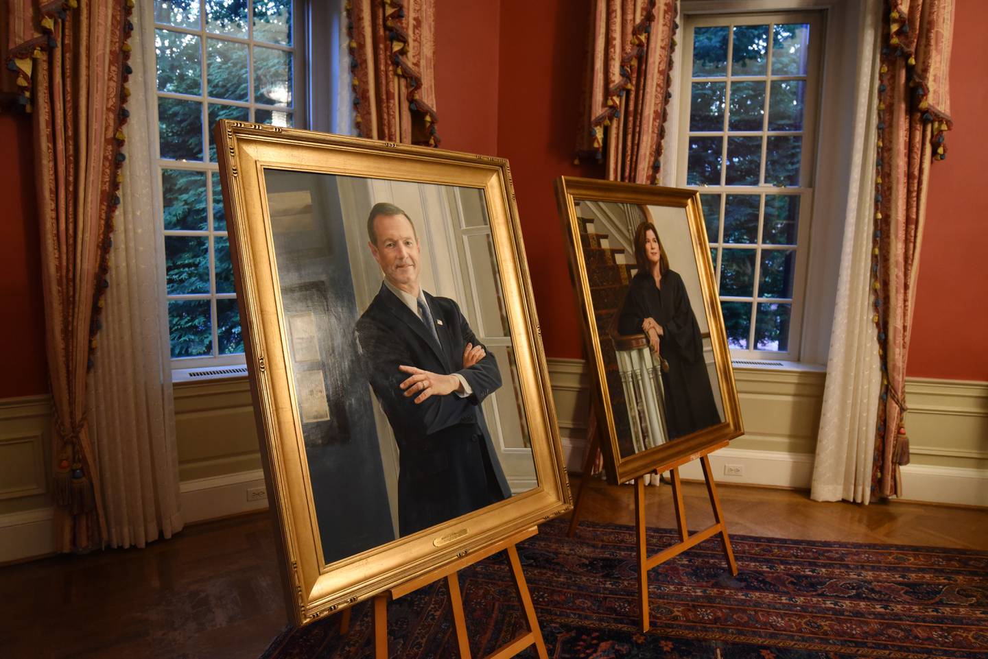 Portraits of former Gov. Martin O'Malley and his wife, Retired District Court Judge Catherine "Katie" Curran O'Malley, are displayed during a private reception at the governor's mansion on Wednesday, July 19, 2023.