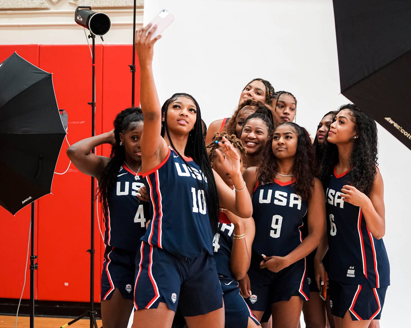 Angel Reese poses with her teammates on the Team USA Americup squad.